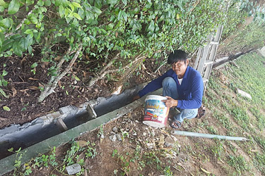 Chang Nom in action - Preparing the park  drainage
